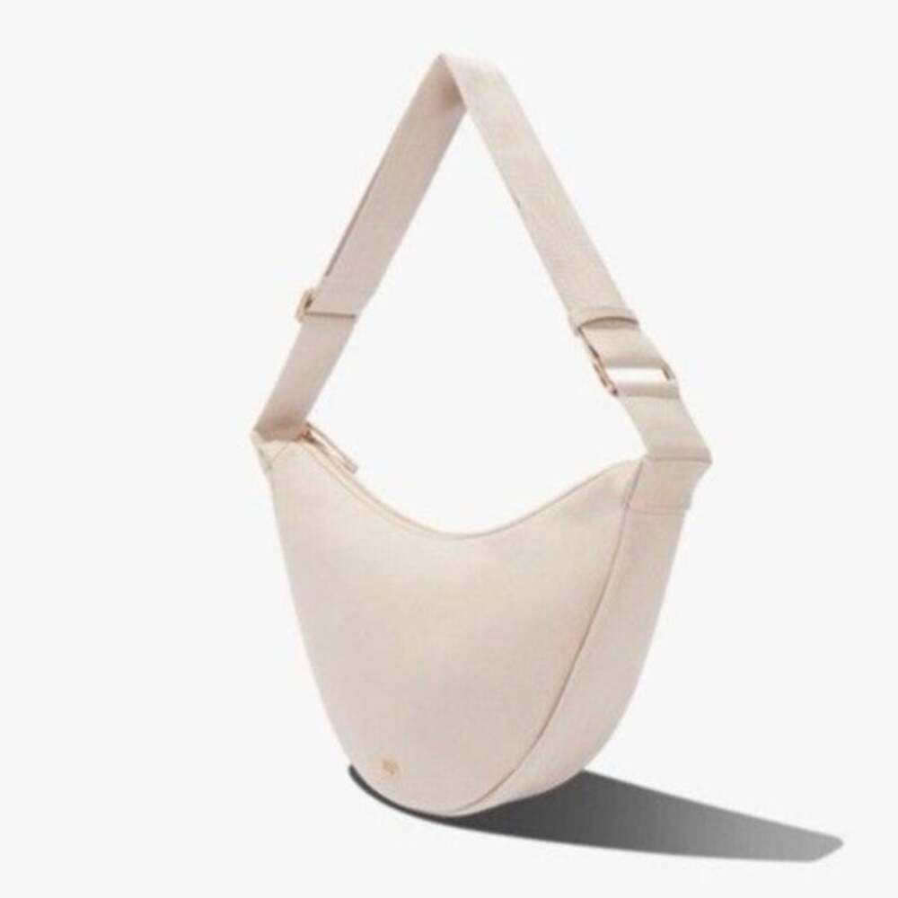 July Everyday Crescent Bag Taupe Canvas Sling crossbody